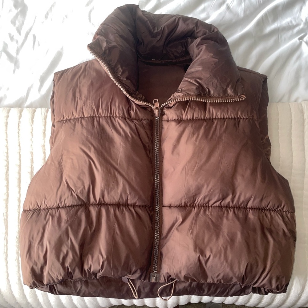 Brown puffer vest with adjustable waist